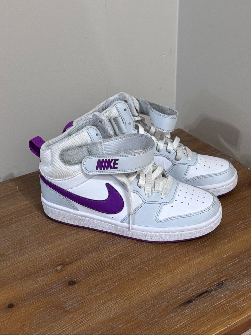 Nike White High-Top Sneakers with Purple Swoosh and Accents